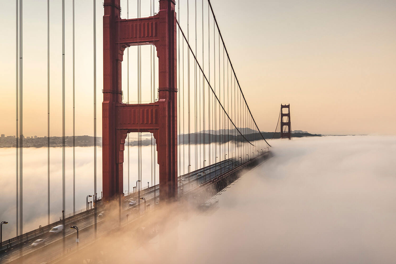 The Golden Gate bridge surrounded by fog
